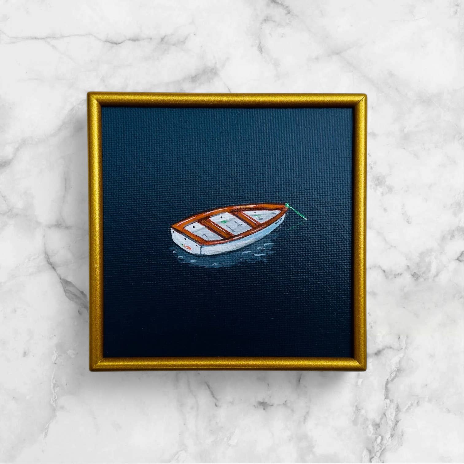 Little Rowboat in Dark Blue Water